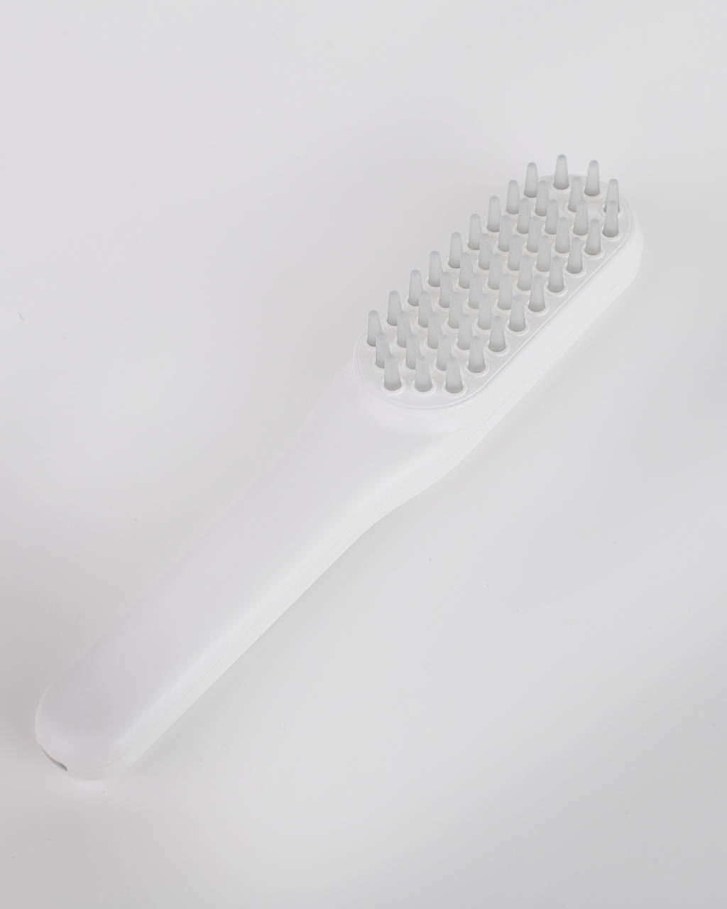 LED light therapy vibrating brush
