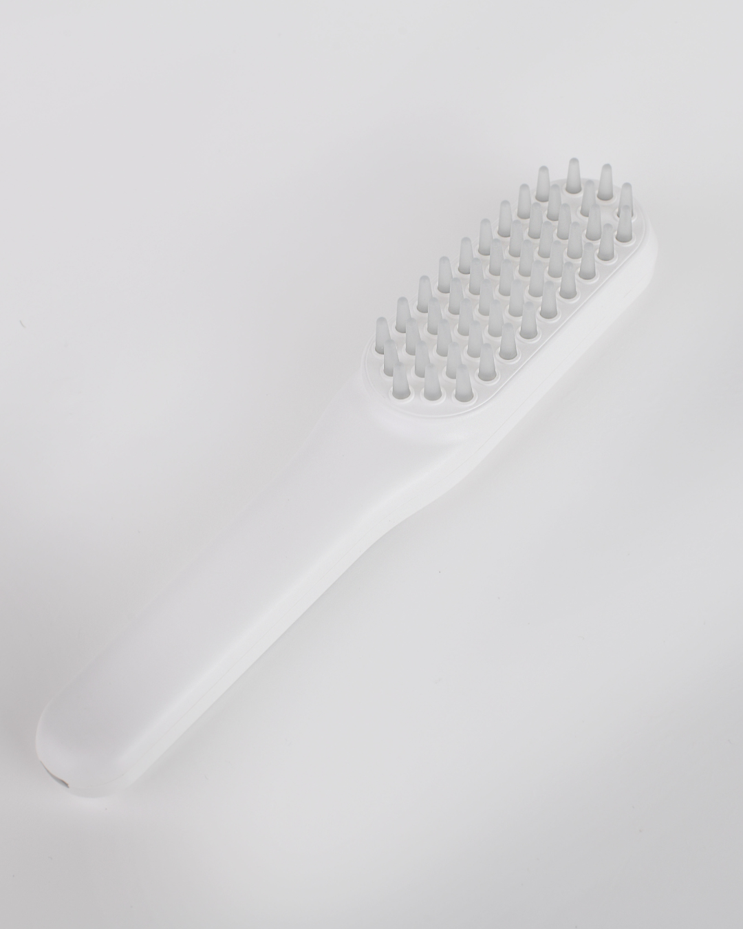LED light therapy vibrating brush