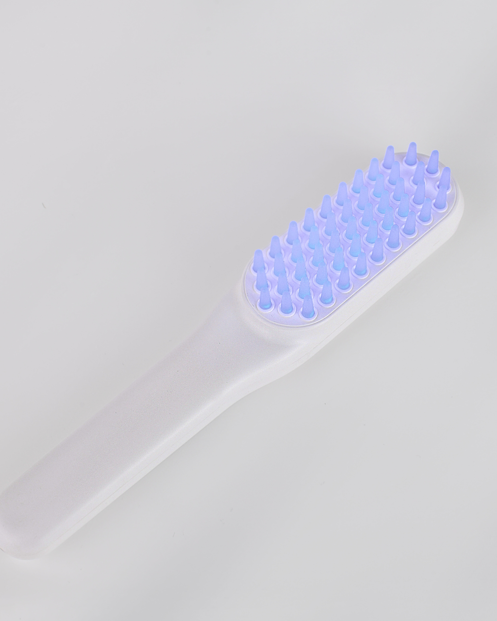 LED light therapy vibrating brush