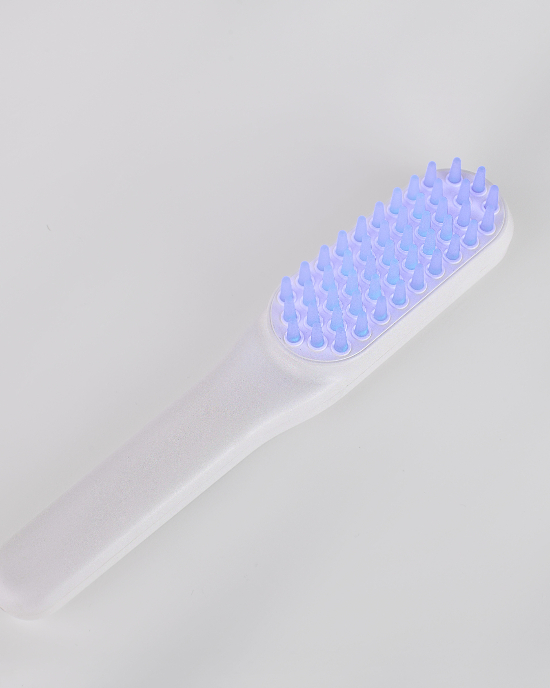 LED light therapy vibrating brush