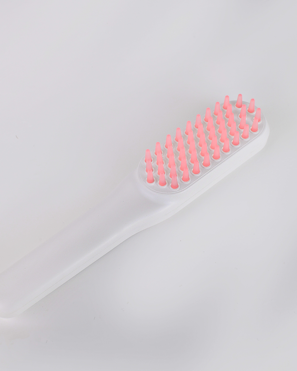 LED light therapy vibrating brush